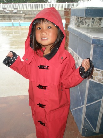 Kasen in her raincoat